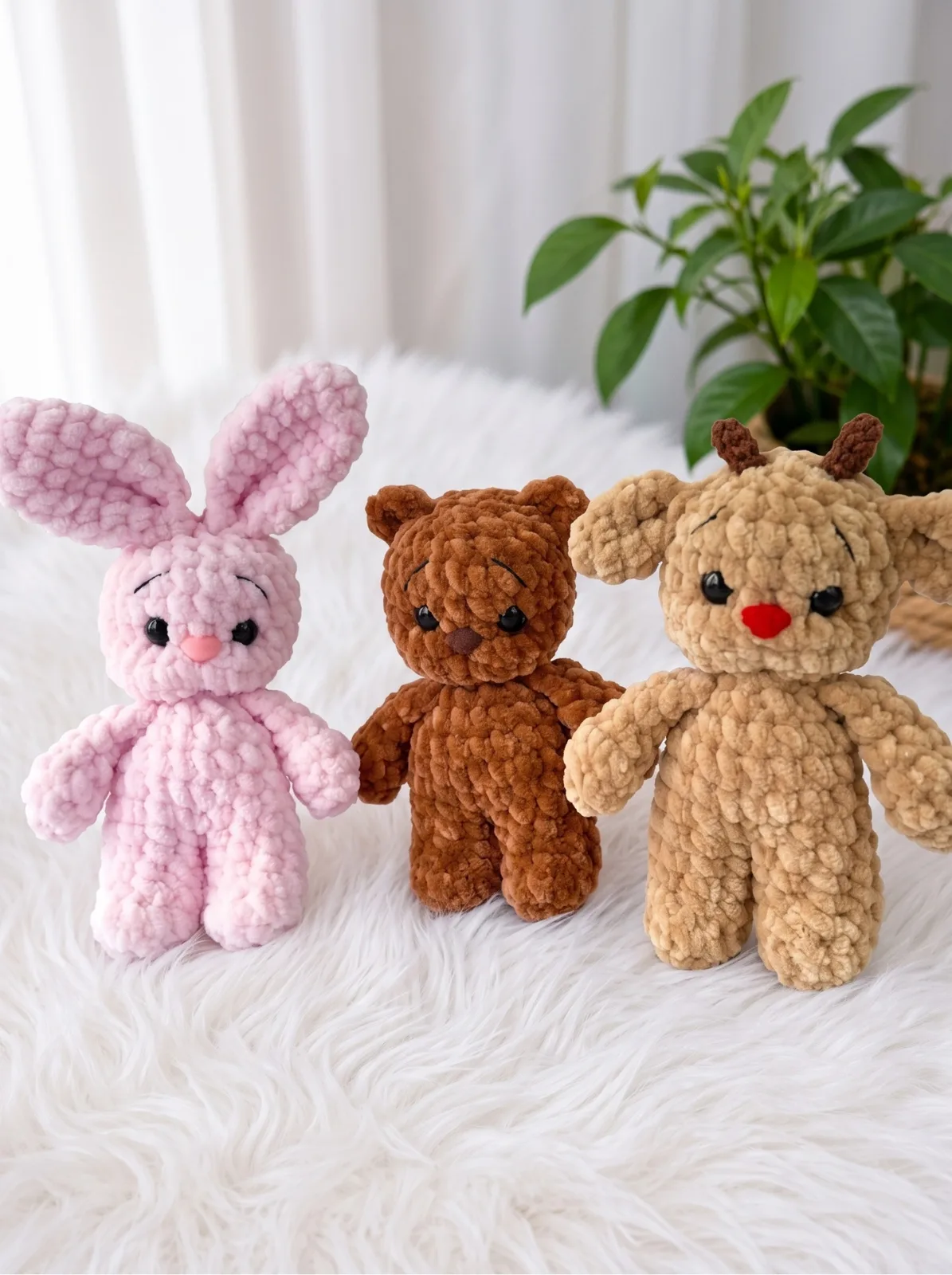 Little amigurumi bunny, bear, and deer trio
