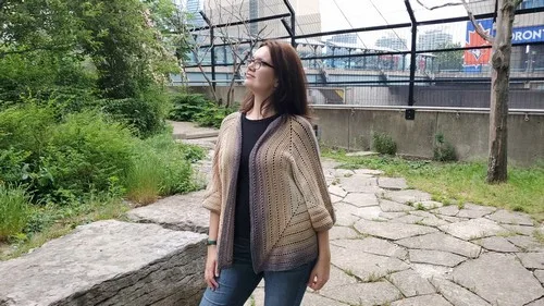 Two-hexagon cardigan with a lacy yoke and mattress-stitch seams